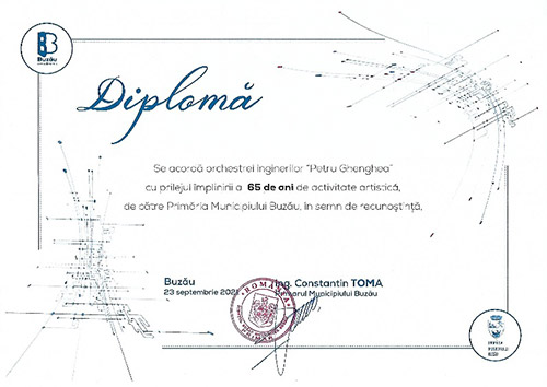 Diplomă acordată de Primăria Municipiului Buzău cu ocazia Concertului aniversar „65 de ani”, susținut la Buzău în septembrie 2021.